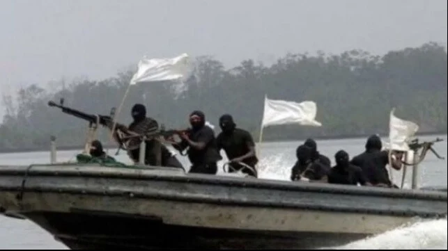 black-clad-armed-men-in boat